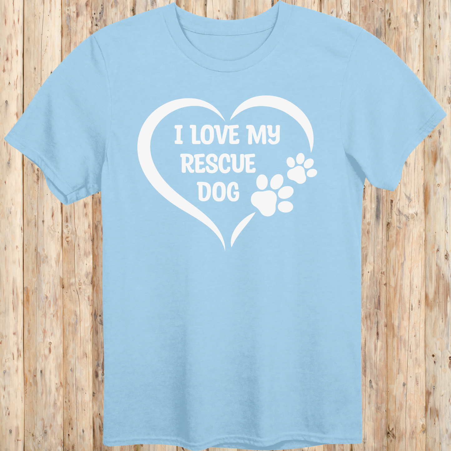Light blue unisex t-shirt with text that says 'I Love My Rescue Dog', perfect for dog adopters and rescue pet supporters