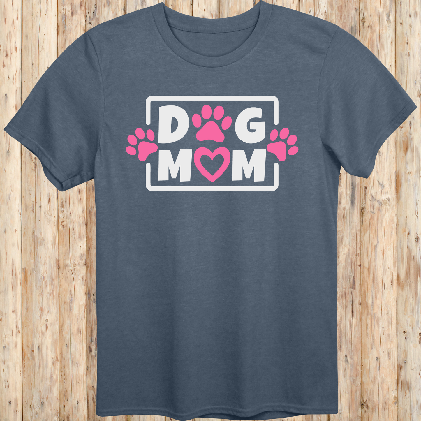 Heather indigo unisex t-shirt with bold text that says 'Dog Mom', ideal for pet moms, dog lovers, and rescue advocates