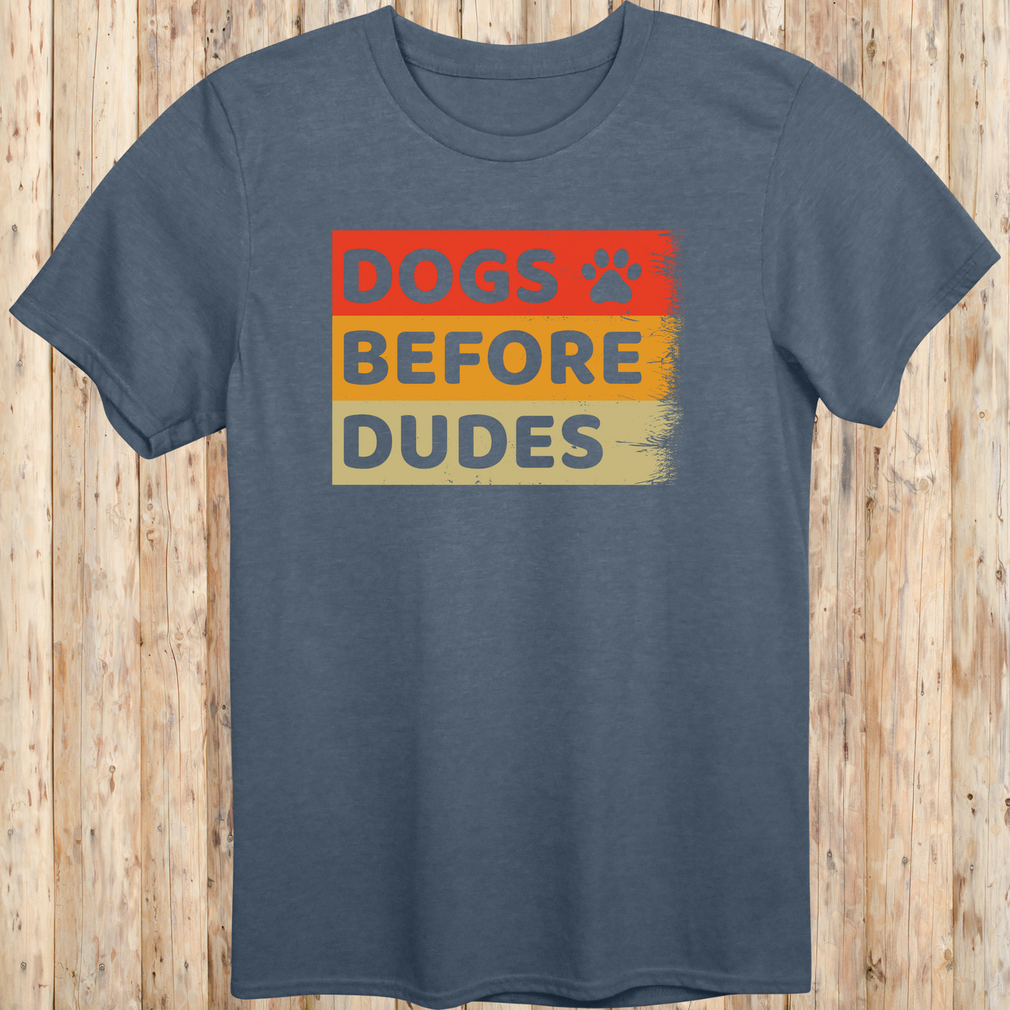 Heather indigo unisex t-shirt with text that says 'Dogs Before Dudes', perfect for dog moms and dog-loving women with a sense of humor
