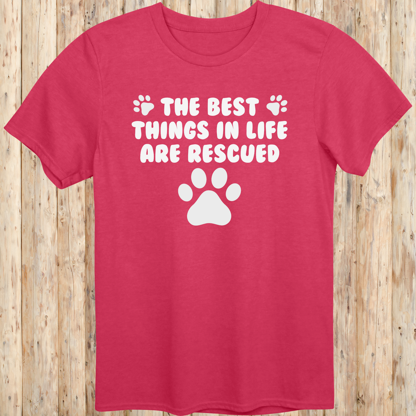 Heather red unisex t-shirt with text that reads 'The Best Things in Life Are Rescued', ideal for rescue dog owners and pet adopters