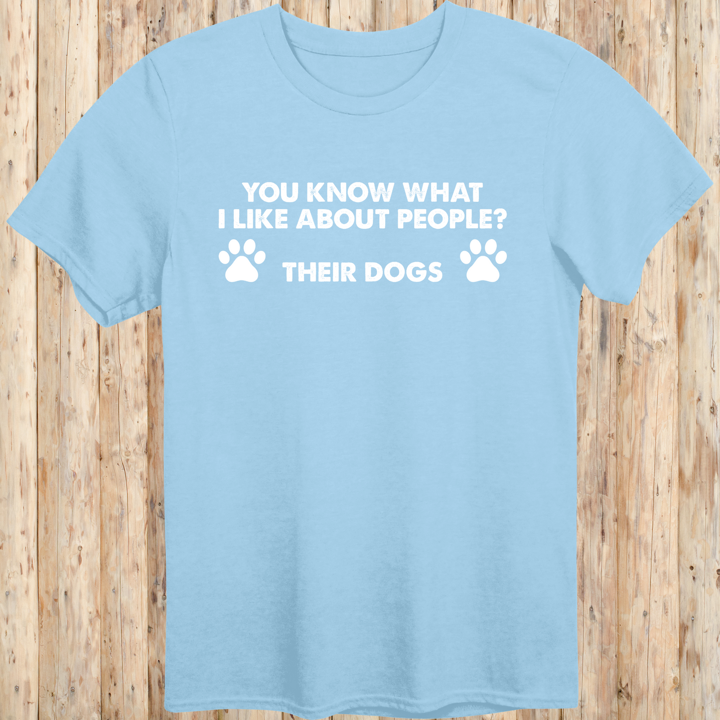 Light blue unisex t-shirt with text that says 'You Know What I Like About People? Their Dogs', perfect for dog lovers with a sense of humor