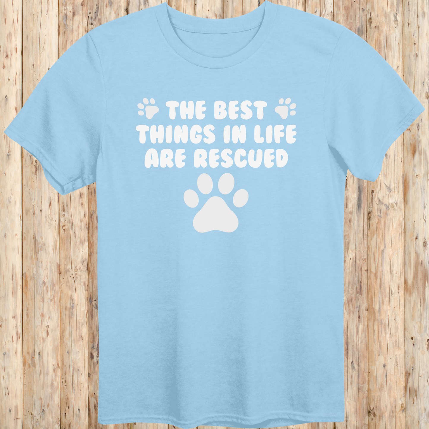 Light blue unisex t-shirt with text that reads 'The Best Things in Life Are Rescued', ideal for rescue dog owners and pet adopters