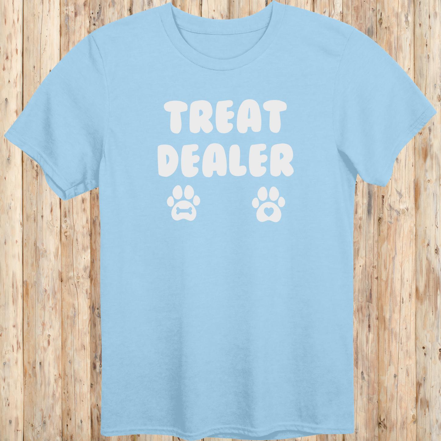 Light blue unisex t-shirt for men and women says Treat Dealer and has 2 paw prints.