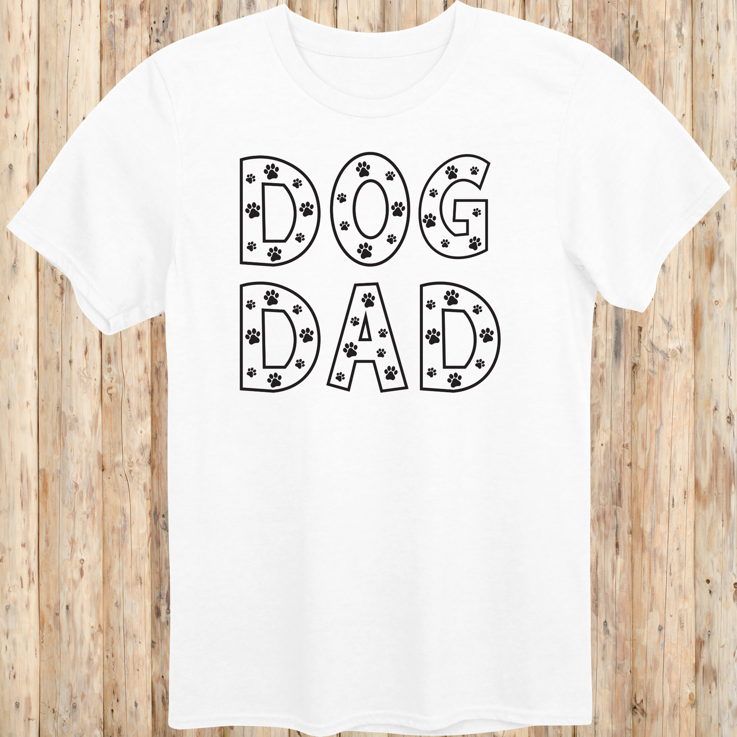 White unisex t-shirt with the words 'Dog Dad' in white text and small paw print accents, perfect for dog dads and pet owners