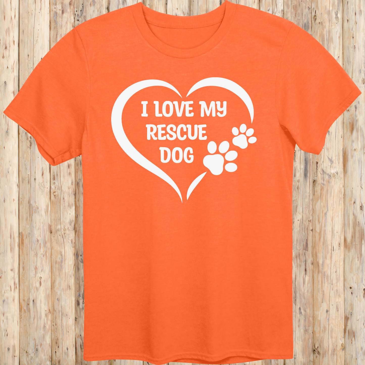 Orange unisex t-shirt with text that says 'I Love My Rescue Dog', perfect for dog adopters and rescue pet supporters