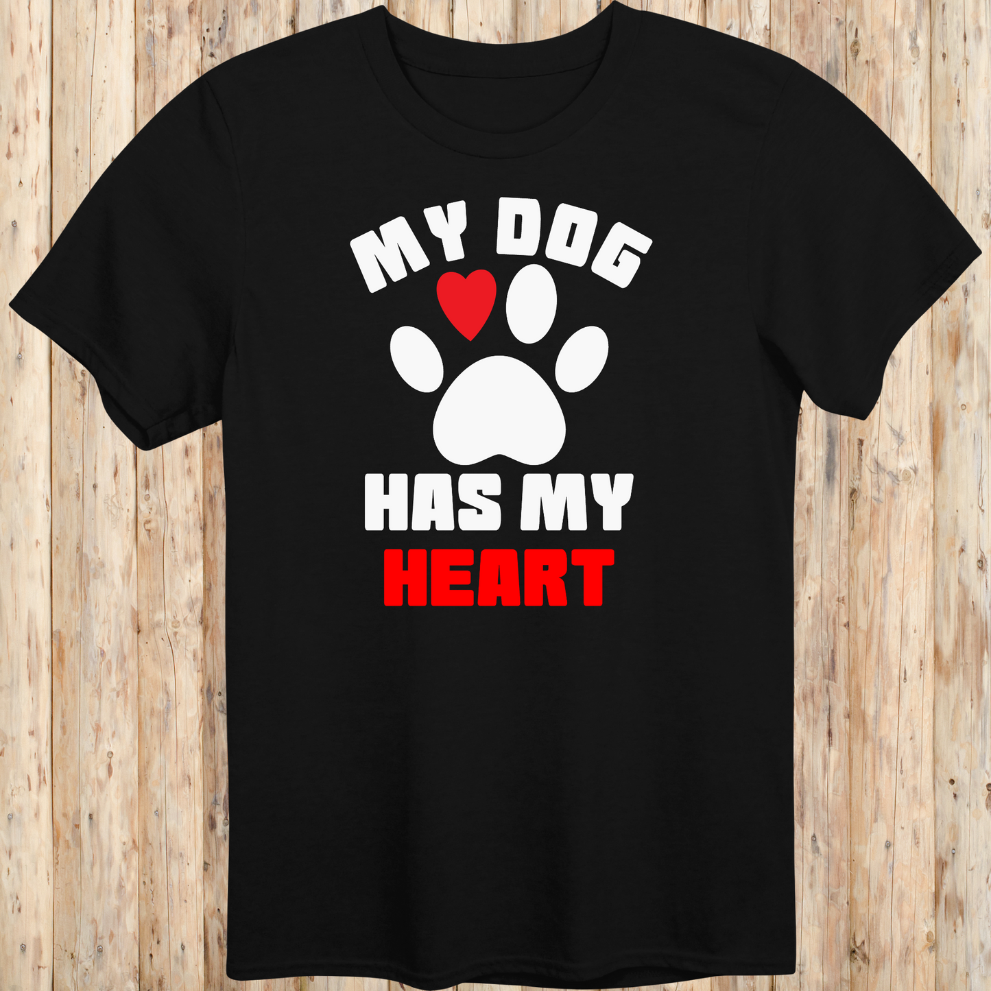Black unisex t-shirt with bold text that reads 'My Dog Has My Heart', perfect for dog lovers and devoted pet parents