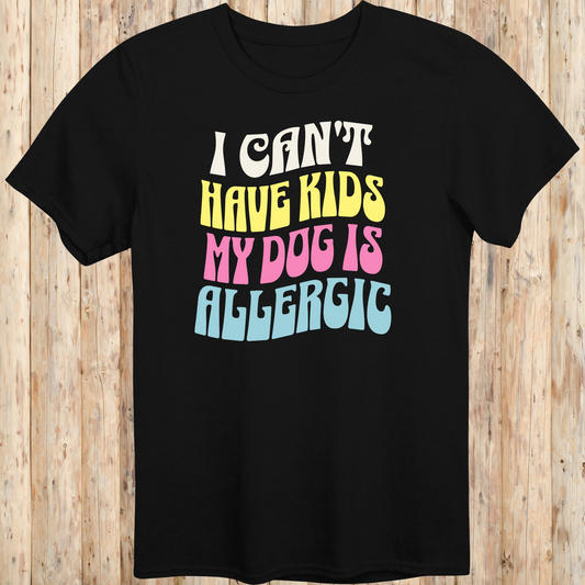 Black unisex t-shirt with white text that says 'I Can’t Have Kids, My Dog Is Allergic', designed for dog lovers with a funny side