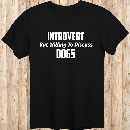 Black unisex t-shirt with white text that reads 'Introvert But Willing to Discuss Dogs', 