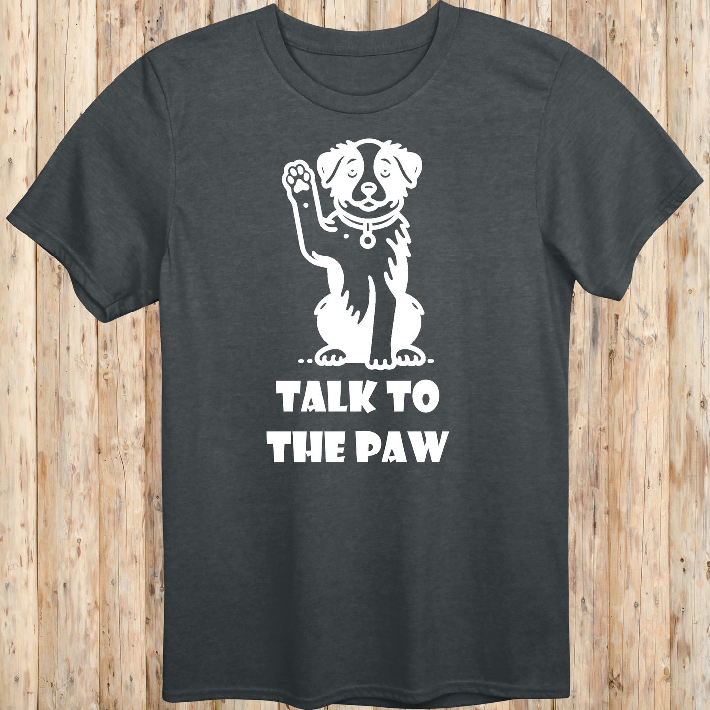 Dark heather unisex t-shirt with text that says 'Talk to the Paw', ideal for dog lovers and pet parents with a fun, sassy style