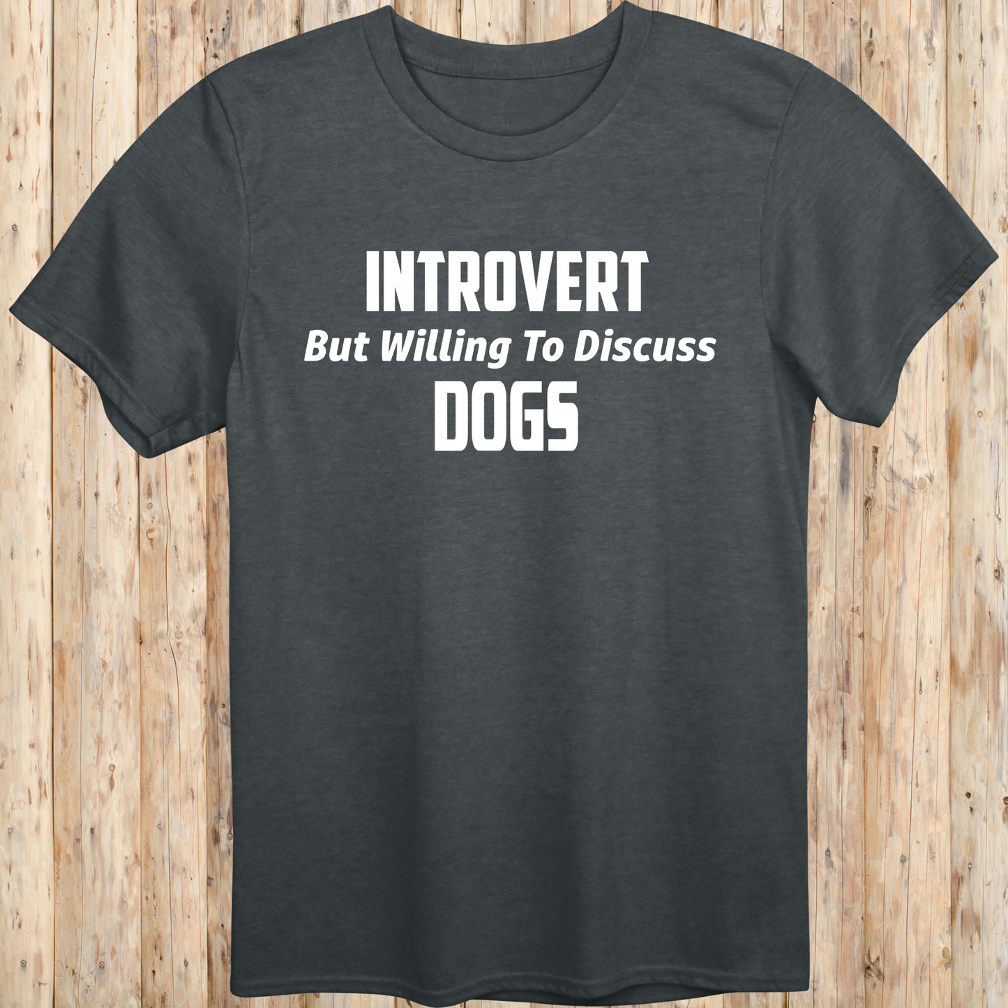 dark heather unisex t-shirt with white text that reads 'Introvert But Willing to Discuss Dogs', 