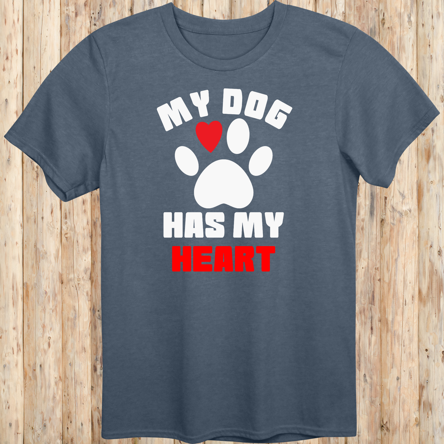 Heather indigo unisex t-shirt with bold text that reads 'My Dog Has My Heart', perfect for dog lovers and devoted pet parents