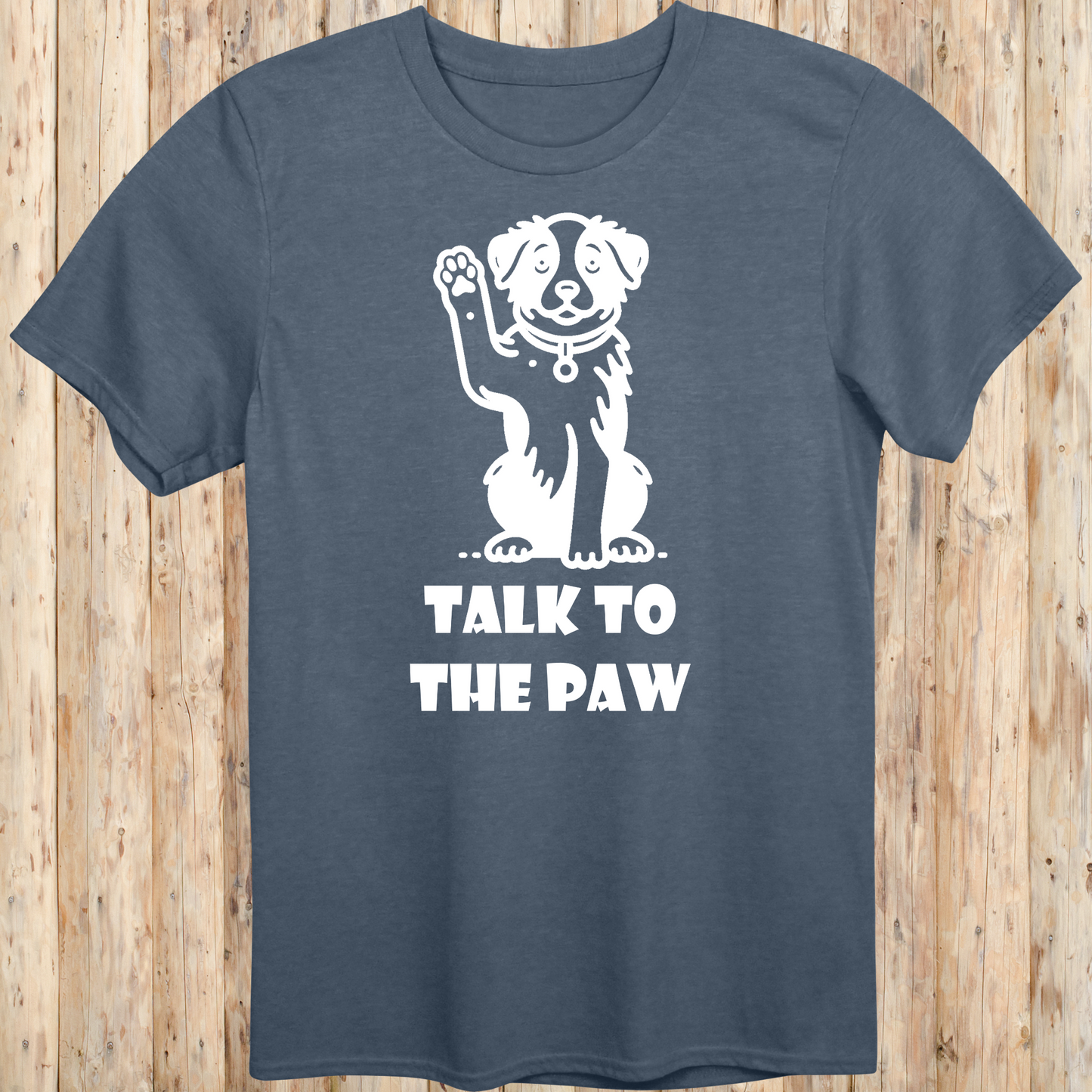 Heather indigo unisex t-shirt with text that says 'Talk to the Paw', ideal for dog lovers and pet parents with a fun, sassy style
