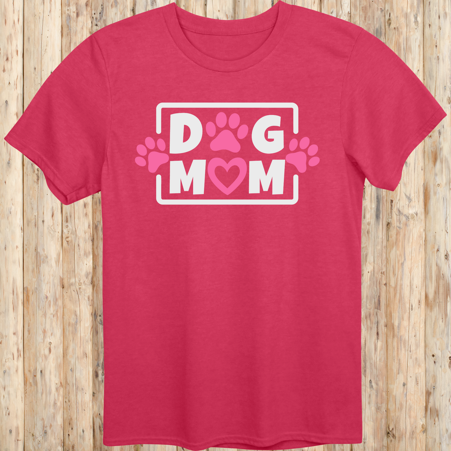 Heather red unisex t-shirt with bold text that says 'Dog Mom', ideal for pet moms, dog lovers, and rescue advocates