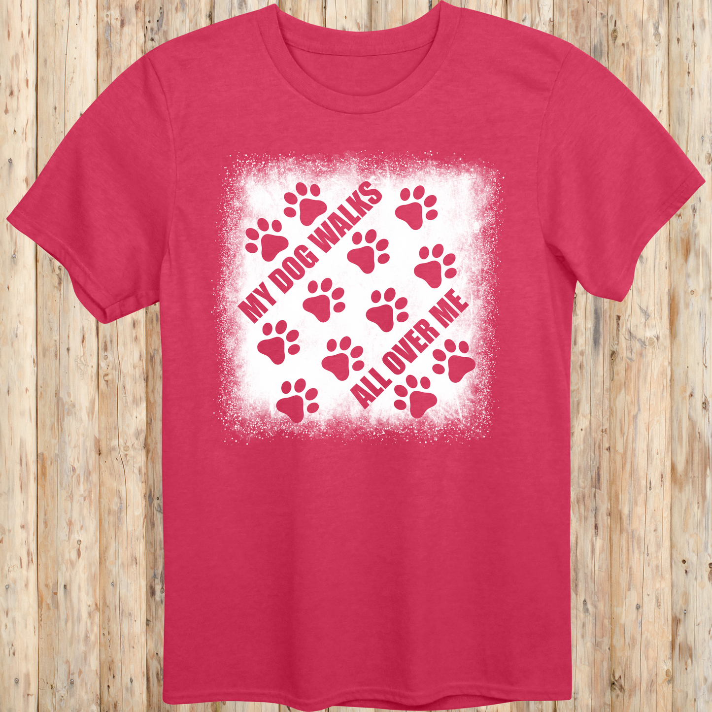 Heather red unisex t-shirt with paw prints and the phrase 'My Dog Walks All Over Me' printed on the front for men women adults and humans.
