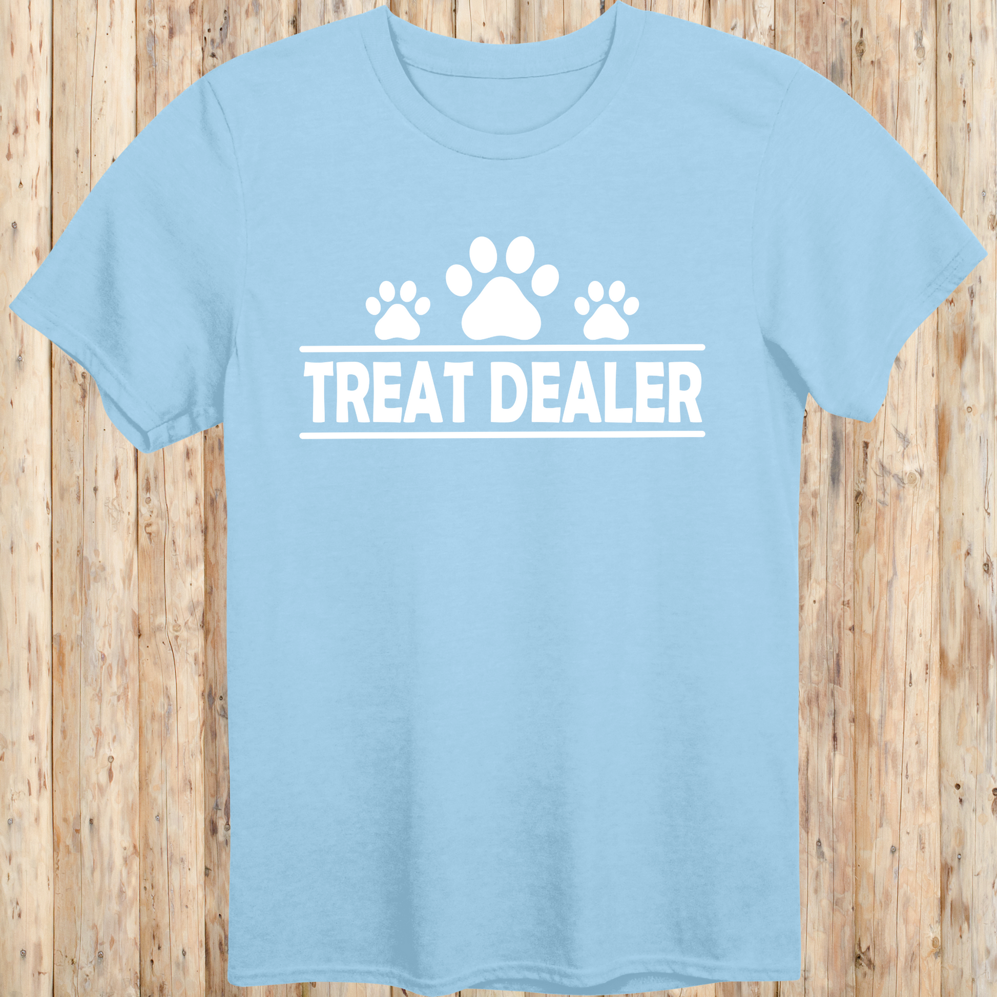 Light blue unisex t-shirt with text that reads 'Treat Dealer', perfect for dog lovers, trainers, and pet parents who spoil their pups
