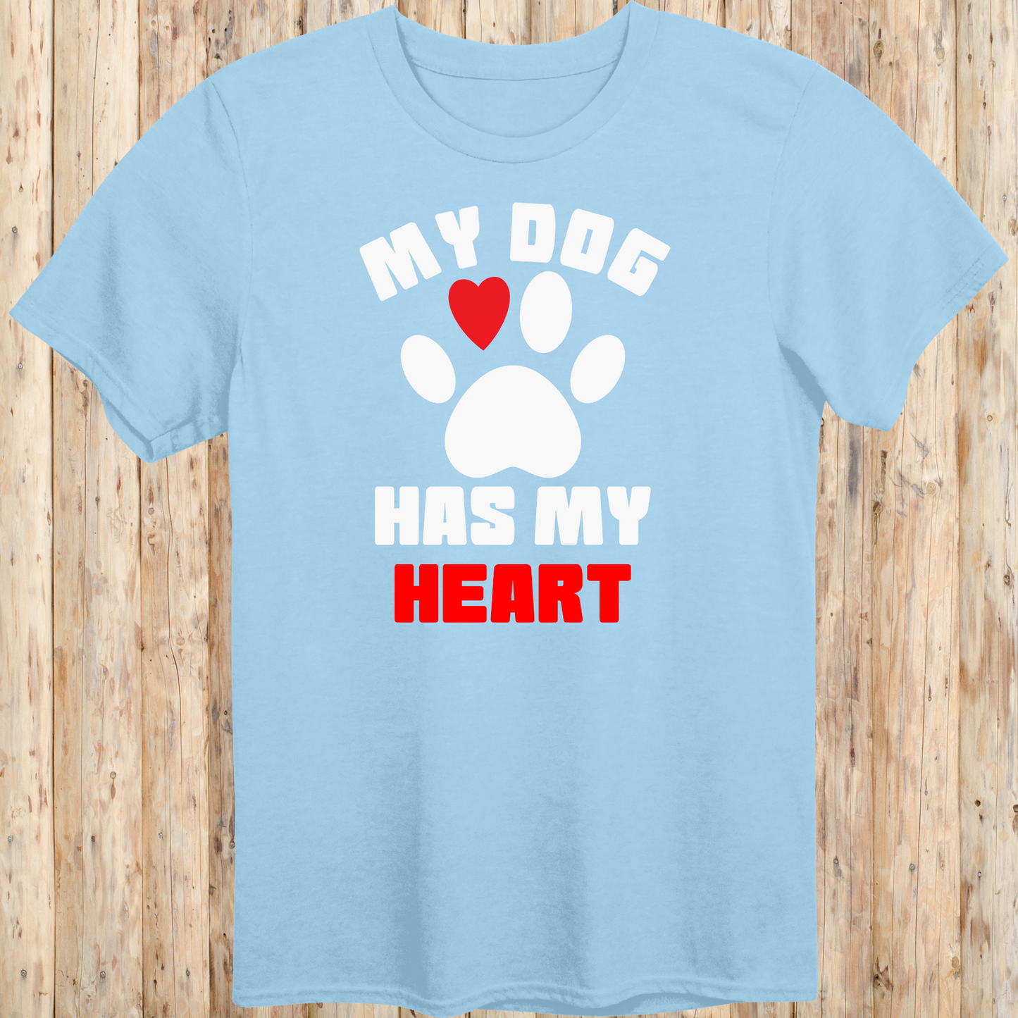 Light blue unisex t-shirt with bold text that reads 'My Dog Has My Heart', perfect for dog lovers and devoted pet parents