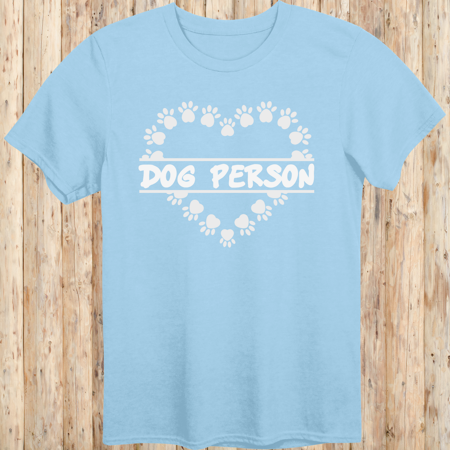 Light blue unisex t-shirt with text that reads 'Dog Person', perfect for dog lovers and pet owners
