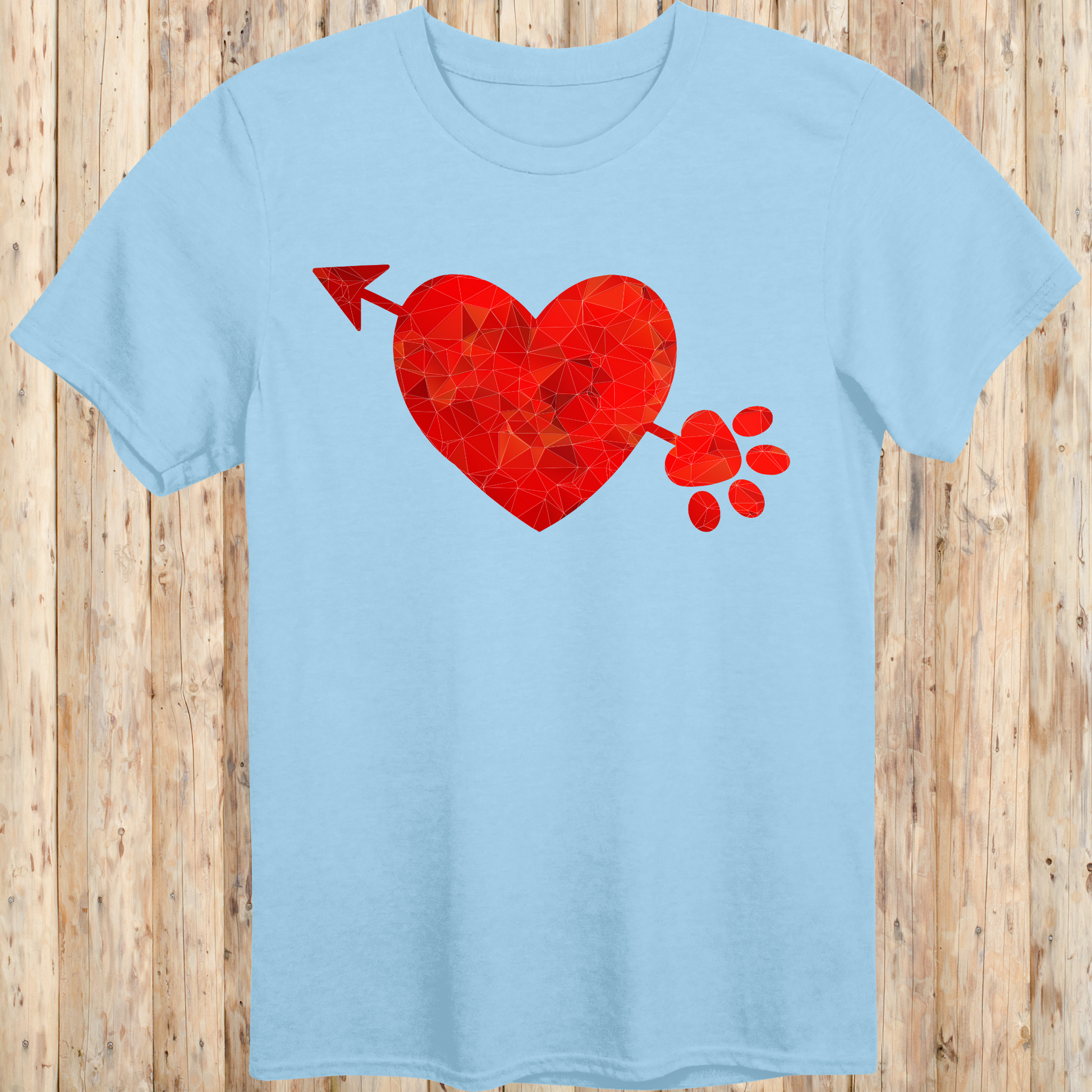 Light blue unisex t-shirt with a heart, arrow, and paw print graphic design, ideal for dog lovers and pet parents
