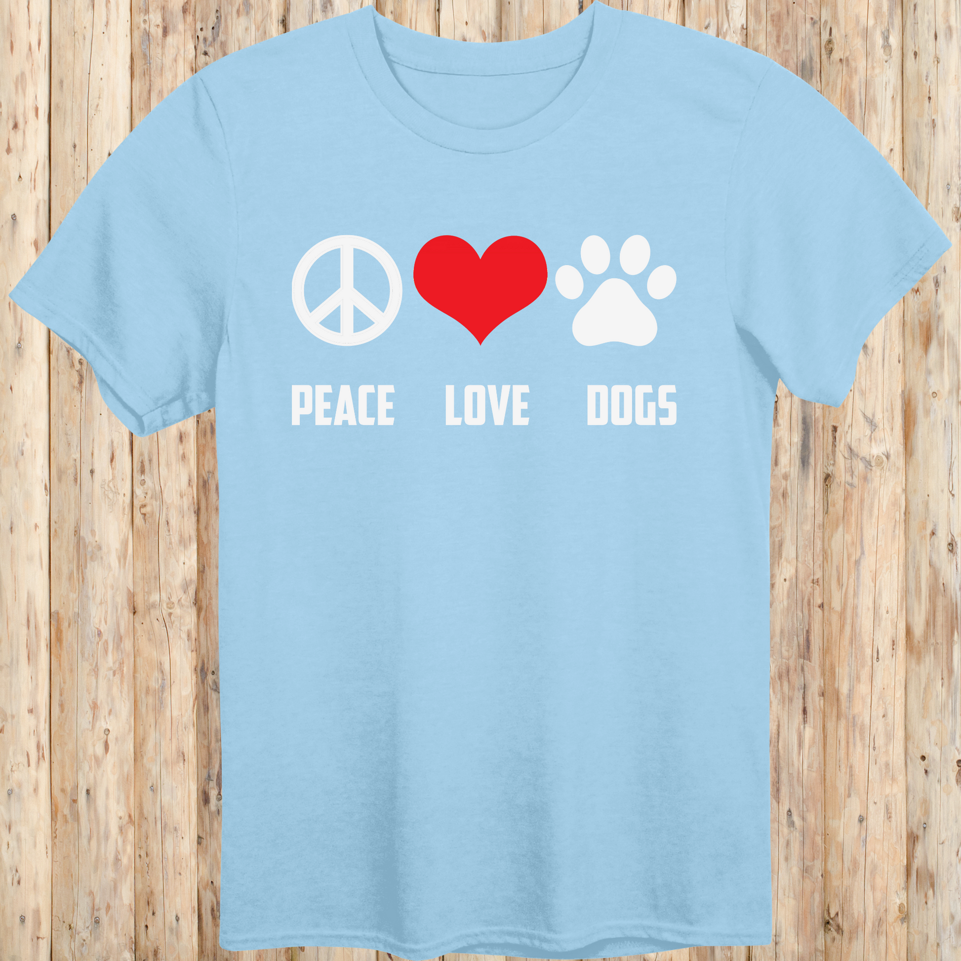 Light blue unisex t-shirt with peace sign, heart, and paw print icons and the text 'Peace Love Dogs', perfect for animal lovers