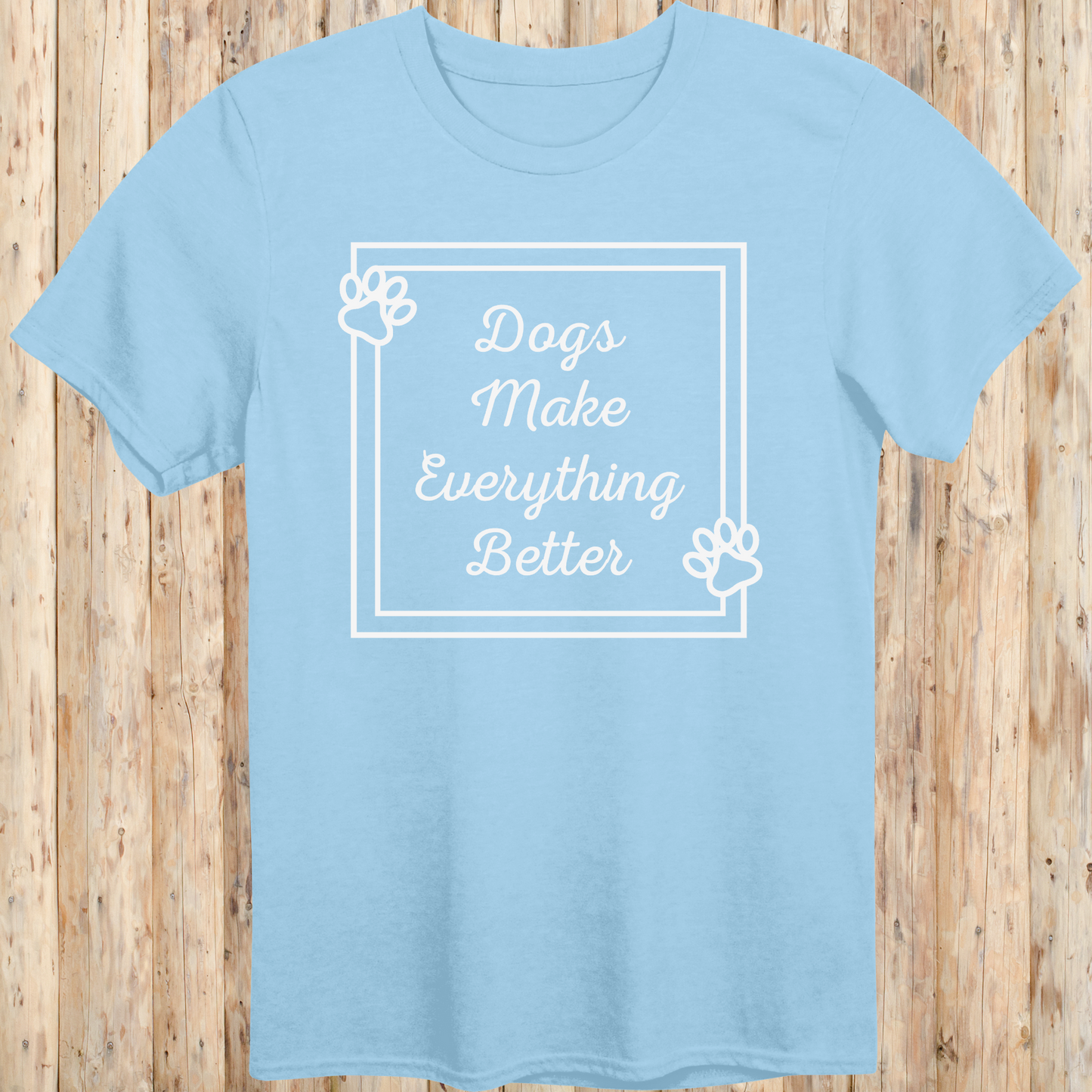 Light blue unisex t-shirt with text that reads 'Dogs Make Everything Better', ideal for dog lovers and animal enthusiasts