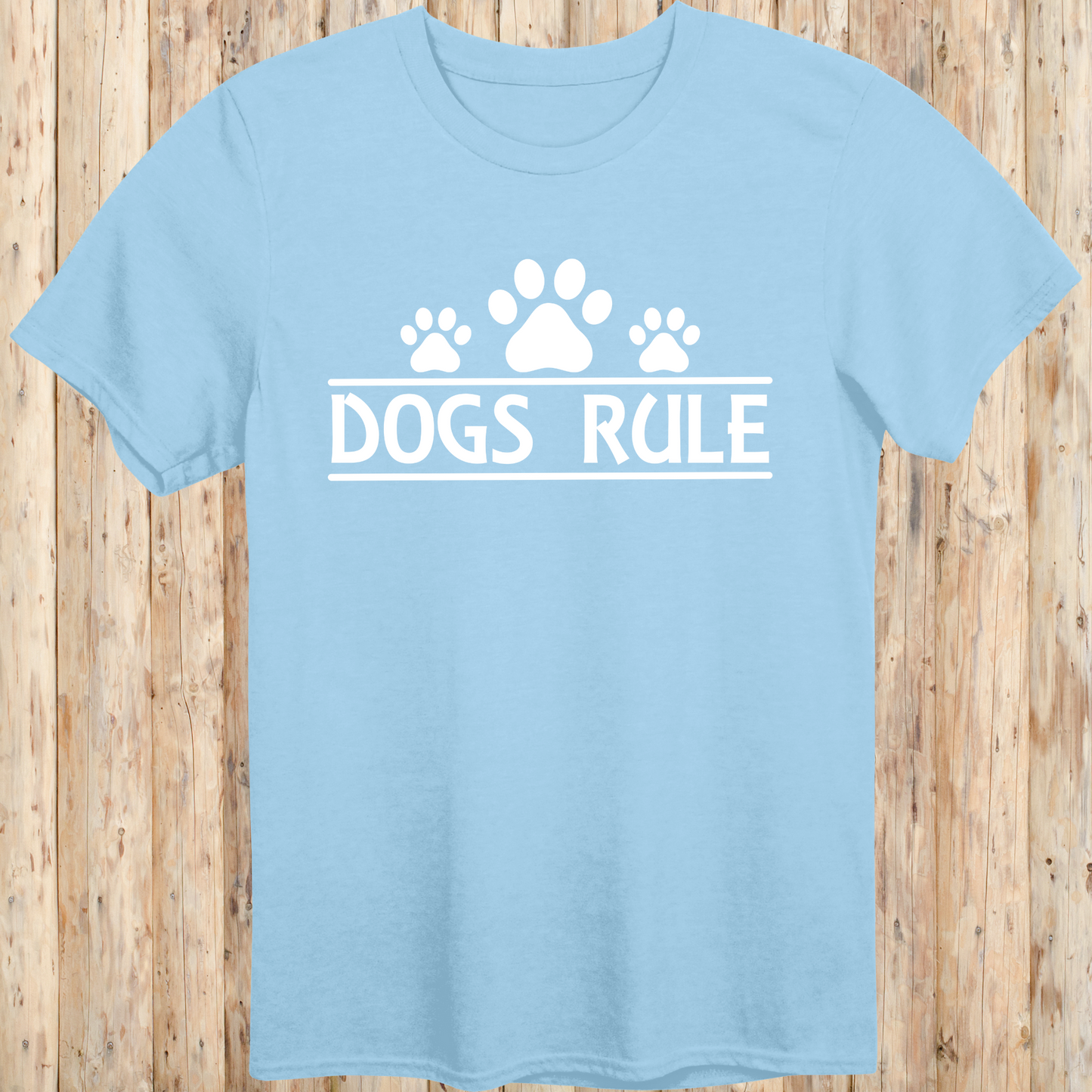 Light blue unisex t-shirt with text that says 'Dogs Rule', ideal for dog lovers and pet enthusiasts