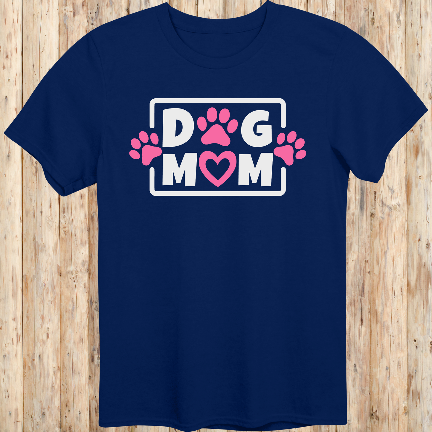 Navy blue unisex t-shirt with bold text that says 'Dog Mom', ideal for pet moms, dog lovers, and rescue advocates