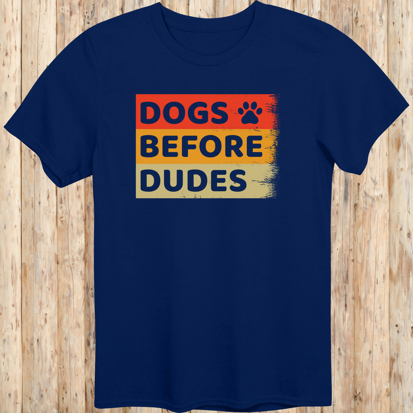 Navy blue unisex t-shirt with text that says 'Dogs Before Dudes', perfect for dog moms and dog-loving women with a sense of humor