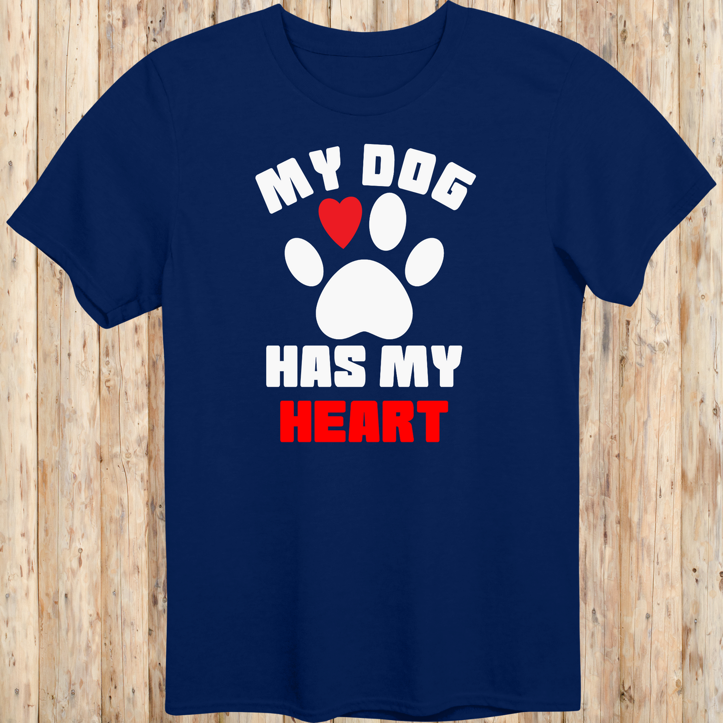 Navy blue unisex t-shirt with bold text that reads 'My Dog Has My Heart', perfect for dog lovers and devoted pet parents