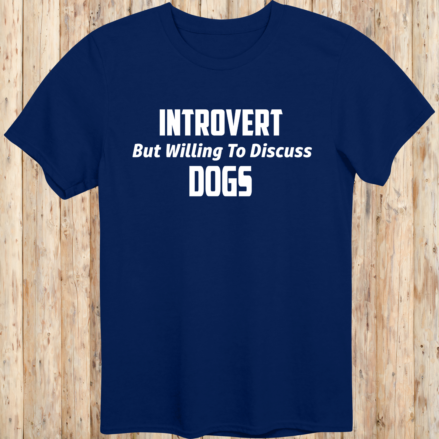navy blue unisex t-shirt with white text that reads 'Introvert But Willing to Discuss Dogs', 