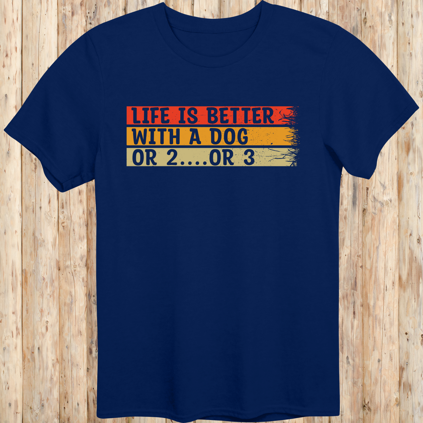 Navy blue unisex t-shirt with text that reads 'Life Is Better With a Dog… or 2 or 3', perfect for multi-dog owners and pet lovers