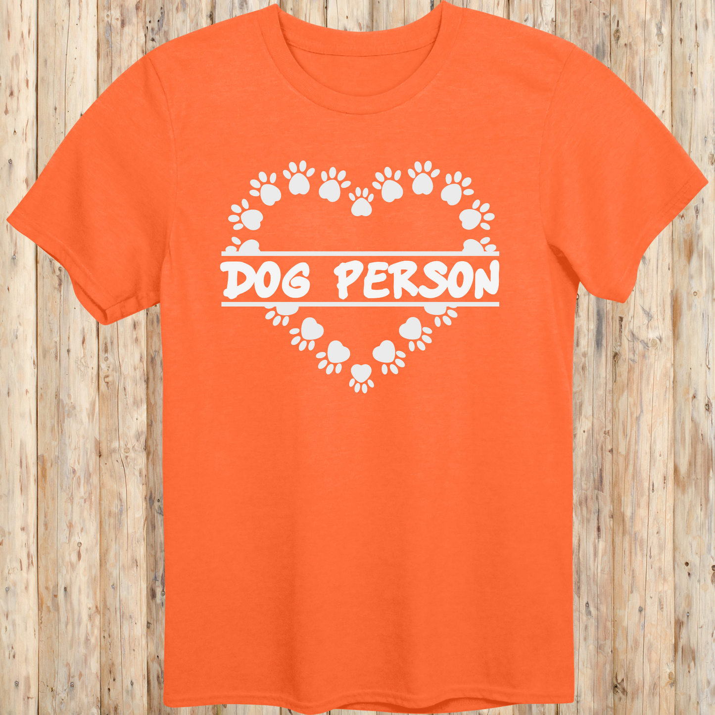 Orange unisex t-shirt with text that reads 'Dog Person', perfect for dog lovers and pet owners