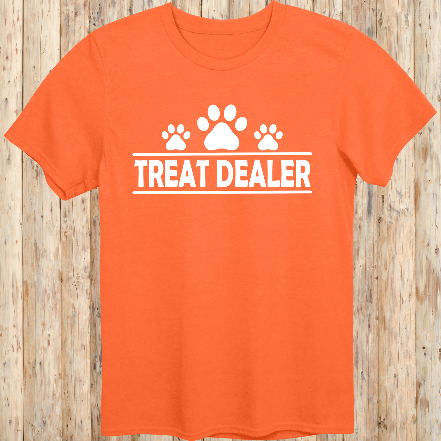 Orange unisex t-shirt with text that reads 'Treat Dealer', perfect for dog lovers, trainers, and pet parents who spoil their pups