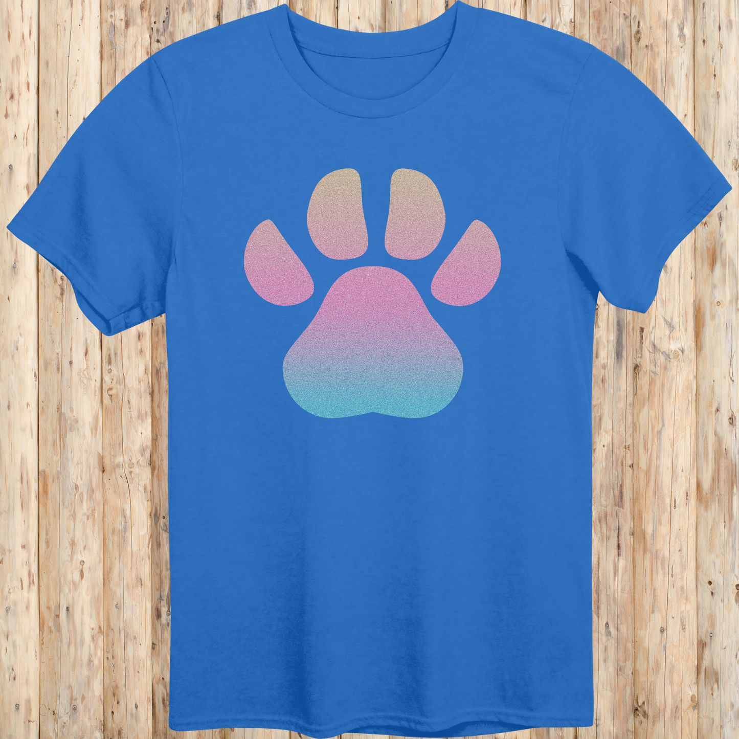 Royal blue unisex t-shirt with a large, colorful dog paw print design on the front, ideal for dog lovers and pet enthusiasts