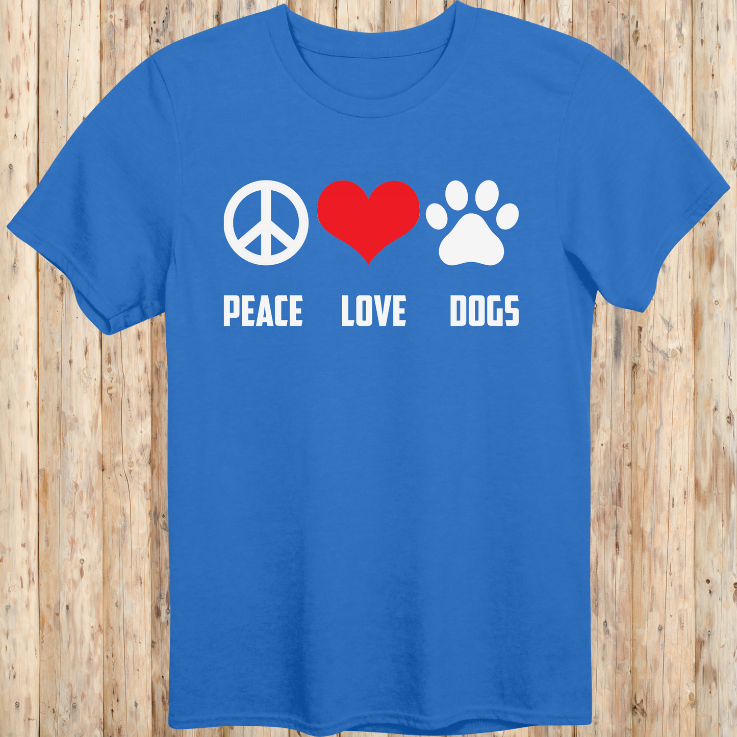 Royal blue unisex t-shirt with peace sign, heart, and paw print icons and the text 'Peace Love Dogs', perfect for animal lovers