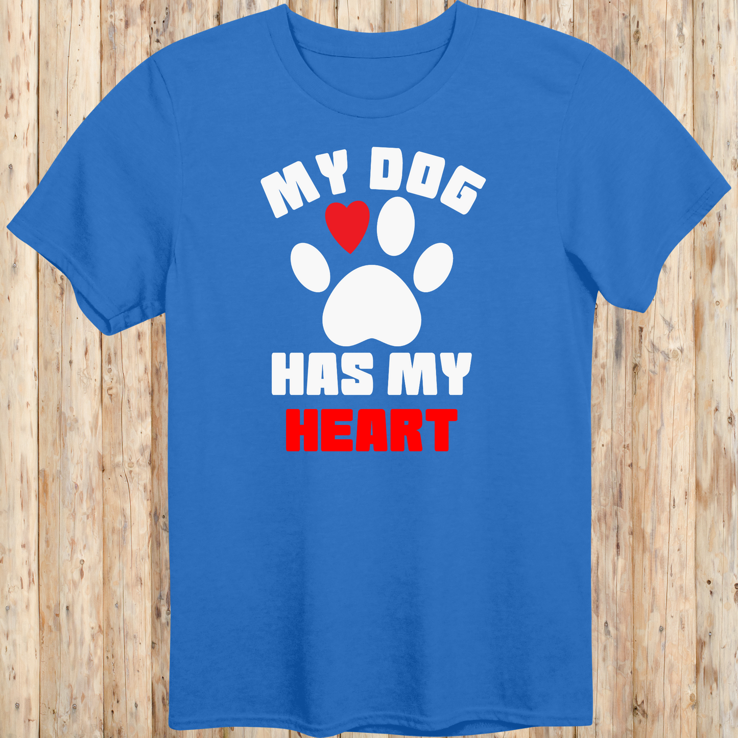 Royal blue unisex t-shirt with bold text that reads 'My Dog Has My Heart', perfect for dog lovers and devoted pet parents