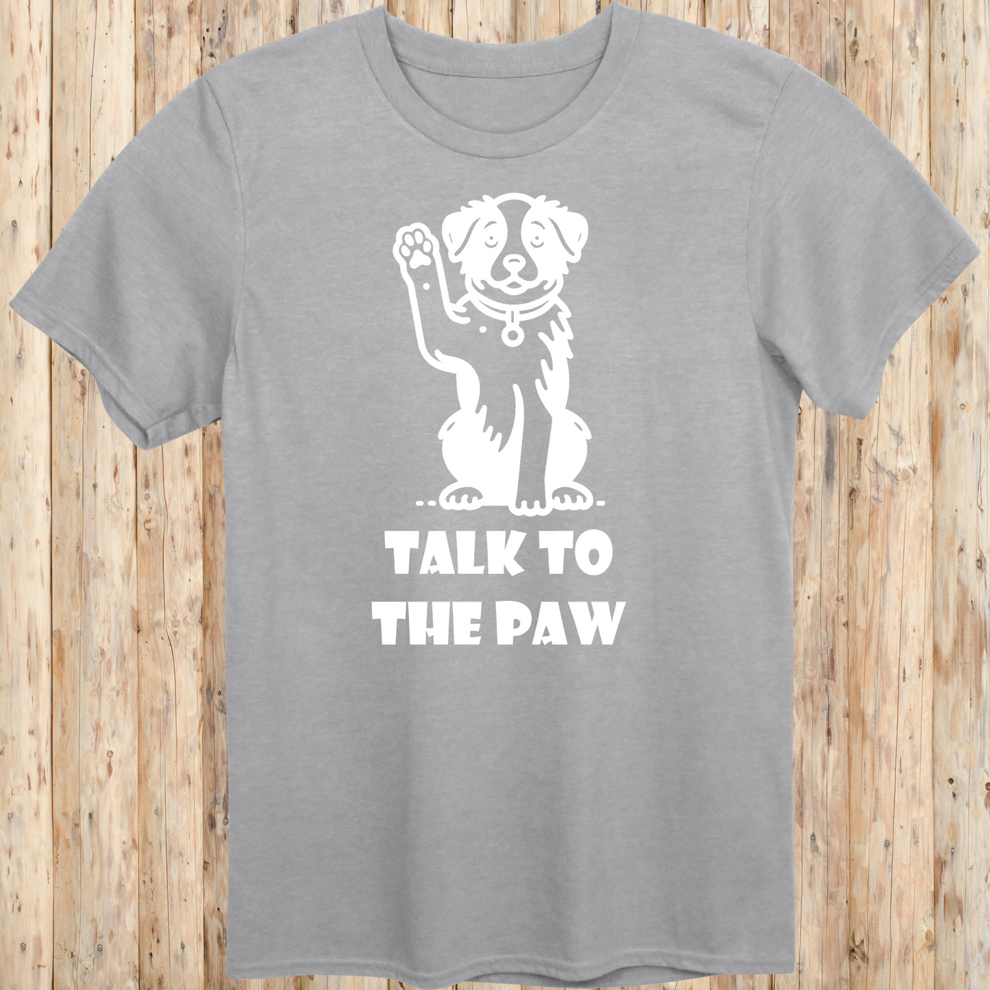 Sport grey unisex t-shirt with text that says 'Talk to the Paw', ideal for dog lovers and pet parents with a fun, sassy style