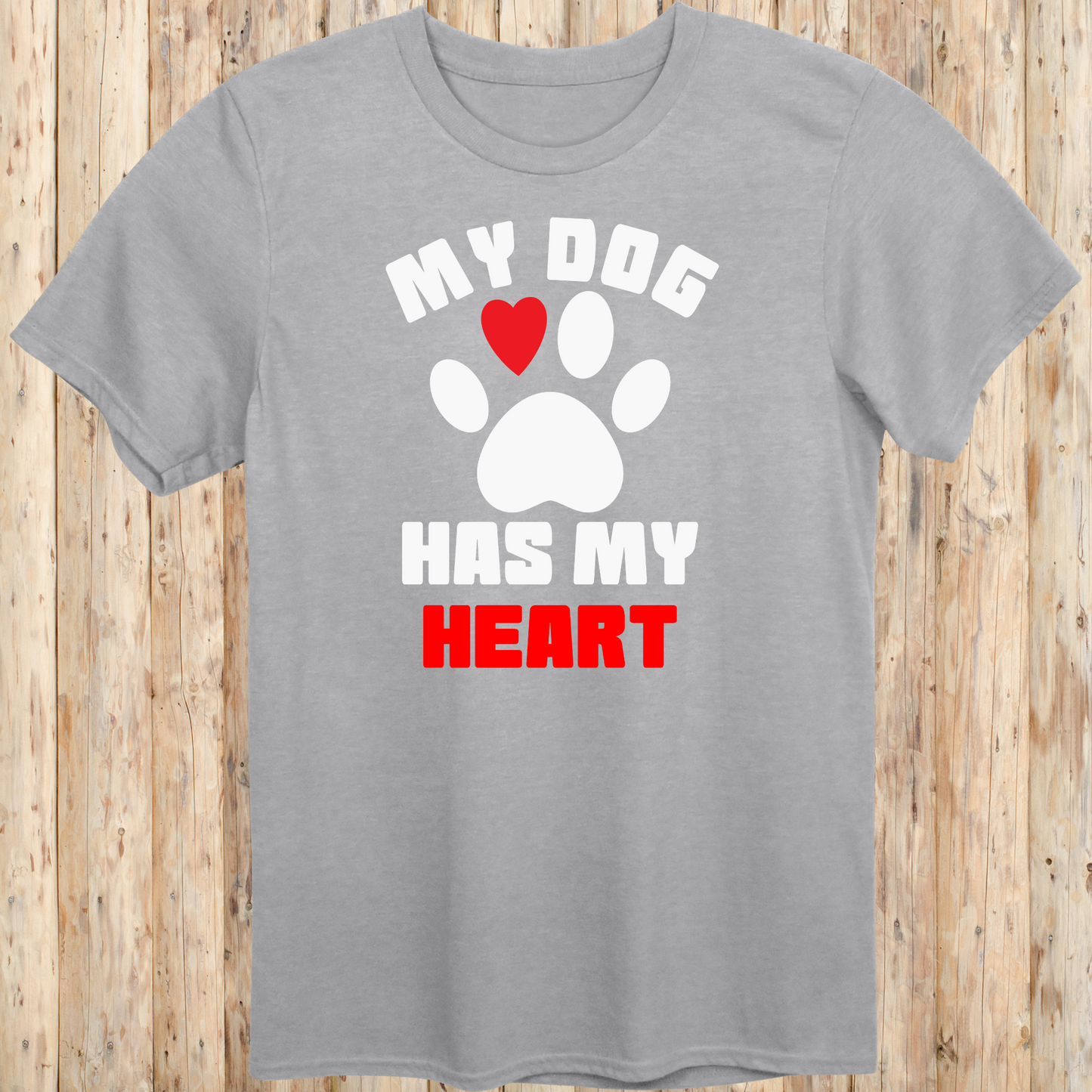 Sport grey unisex t-shirt with bold text that reads 'My Dog Has My Heart', perfect for dog lovers and devoted pet parents