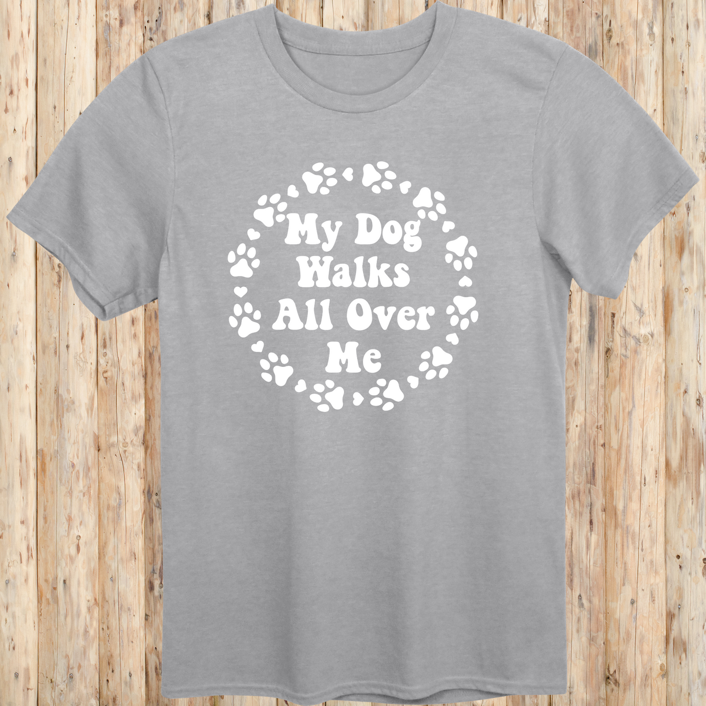 unisex sport grey t-shirt for dog lovers says my dog walks all over me paw prints circle