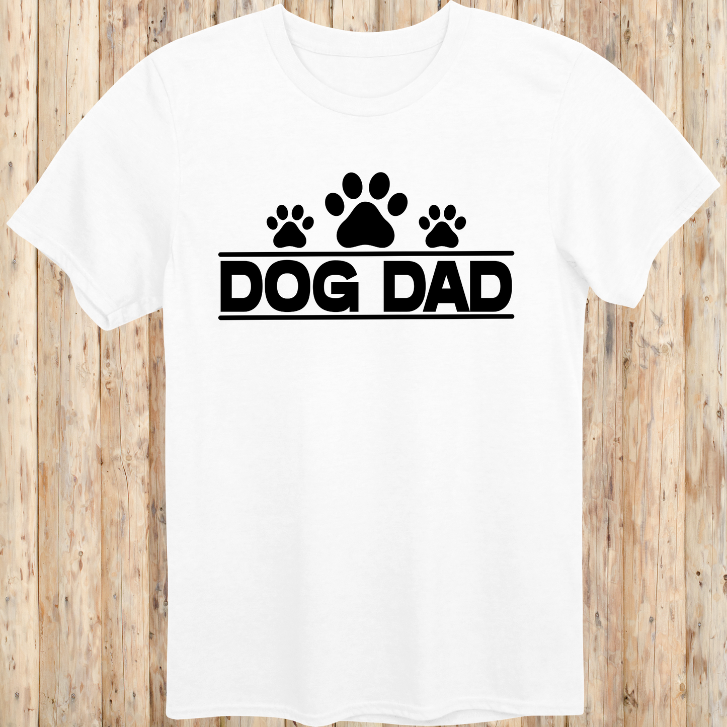 White unisex t-shirt with bold text that says 'Dog Dad', perfect for fathers, pet owners, and dog lovers