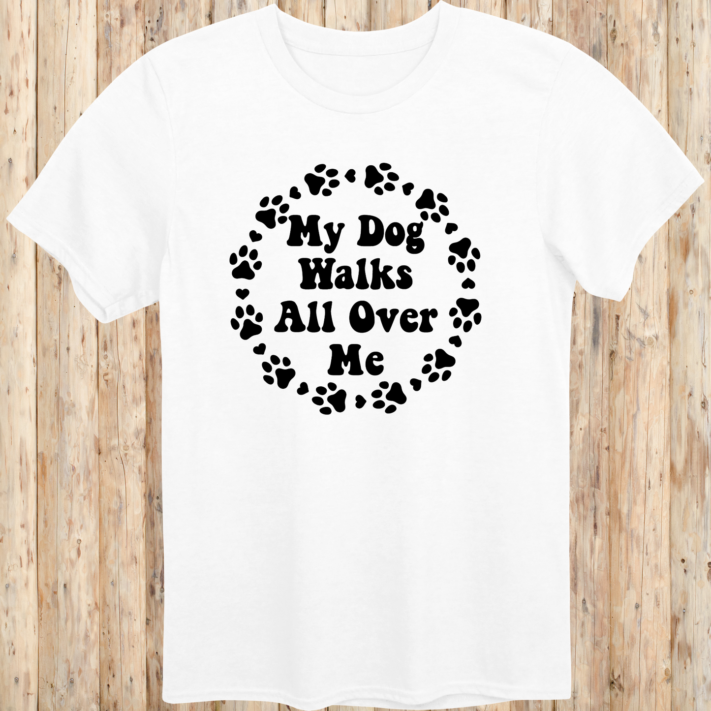 unisex white t-shirt for dog lovers says my dog walks all over me paw prints circle