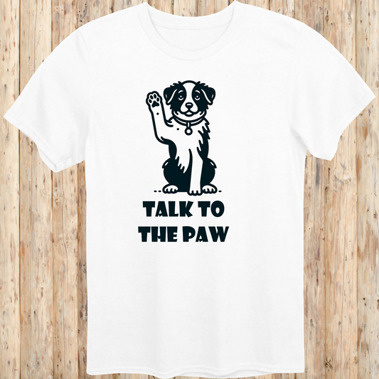 White unisex t-shirt with text that says 'Talk to the Paw', ideal for dog lovers and pet parents with a fun, sassy style