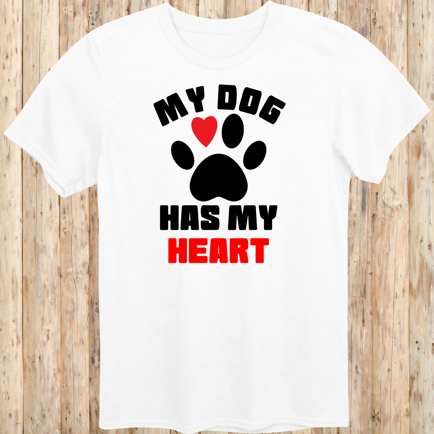 White unisex t-shirt with bold text that reads 'My Dog Has My Heart', perfect for dog lovers and devoted pet parents
