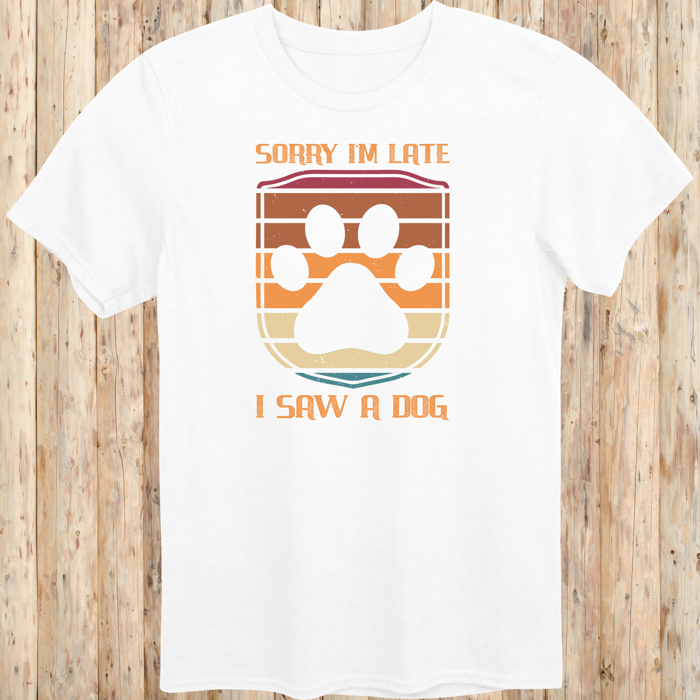 White unisex t-shirt with retro-colored paw print shield and the phrase 'Sorry I’m Late, I Saw a Dog', perfect for dog lovers