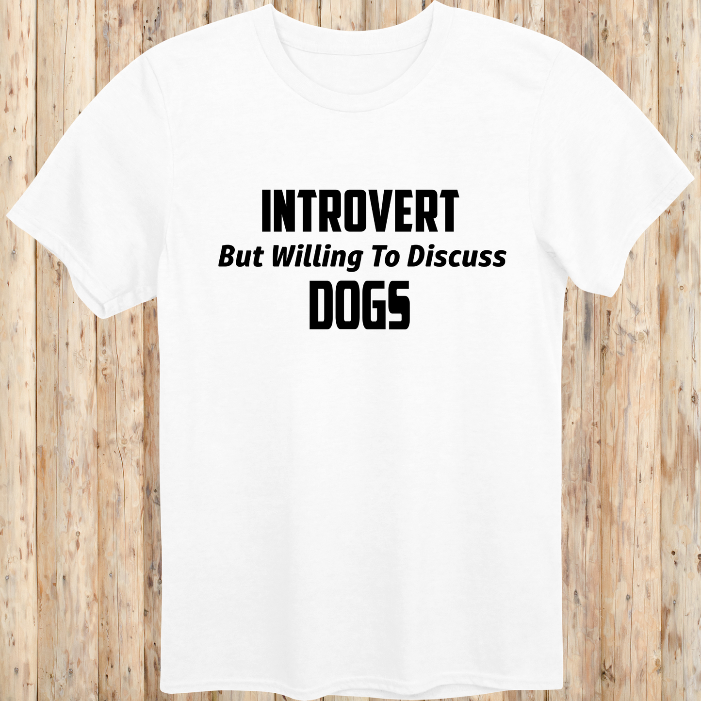 white unisex t-shirt with black text that reads 'Introvert But Willing to Discuss Dogs', 