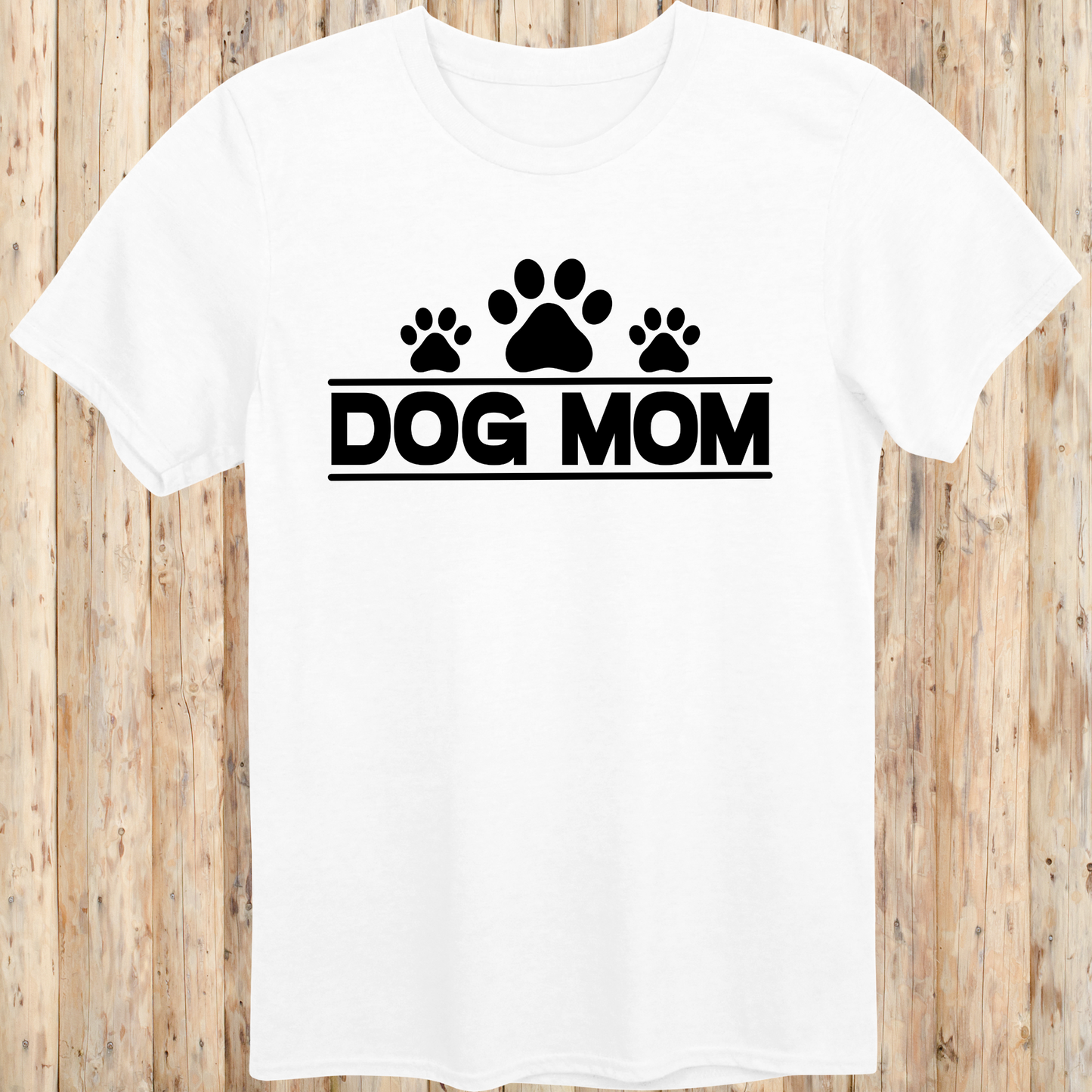 White unisex t-shirt with bold text that reads 'Dog Mom', ideal for pet parents, dog lovers, and animal rescue supporters
